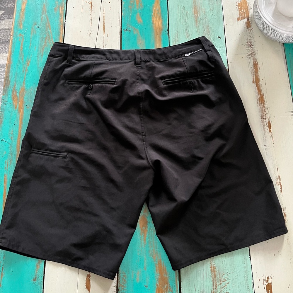 Ripcurl black Mirage hybrid shorts, size 34